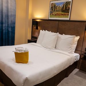 Kamer met een Queen Size Bed met de Toegang voor Gehandicapten